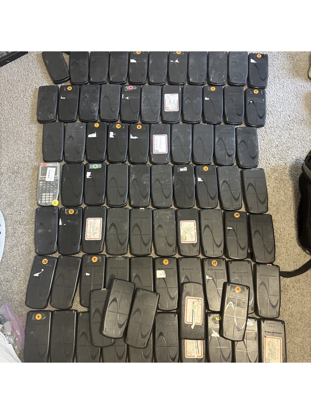 Lot of 77 Texas Instruments TI-83 + Plus Graphing Calculators For Parts Repair